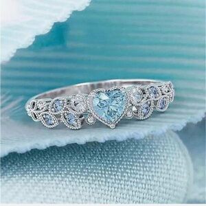 Elegant Silver Heart Ring with Blue Accents